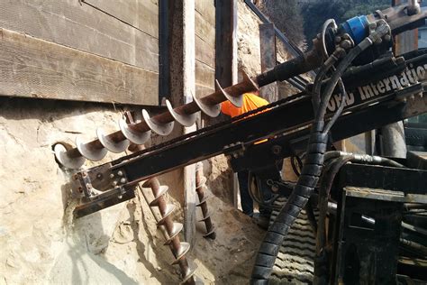 word rock skid steer attachment